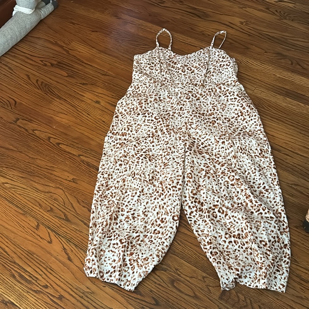 Tan and cream cheetah jumpsuit with smocking and pockets